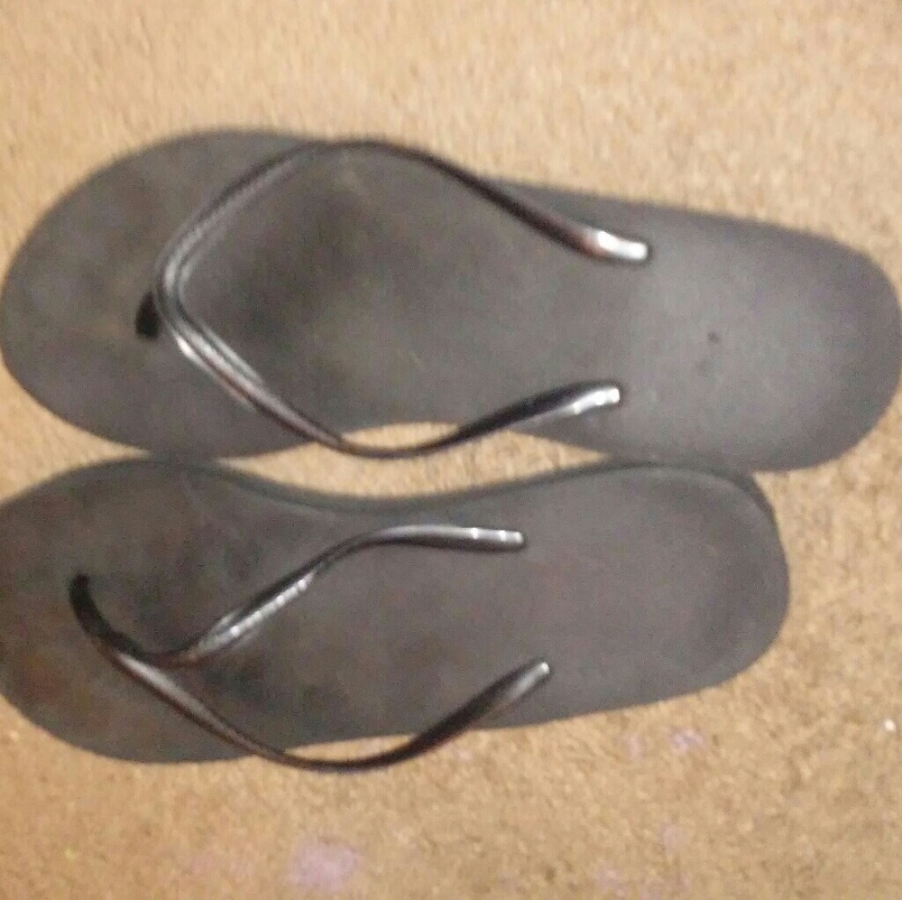 Plain black flip flops